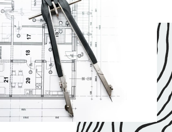 Zirkel auf einem Architektenplan